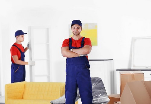 Man with van loading furniture for a Woolwich home move