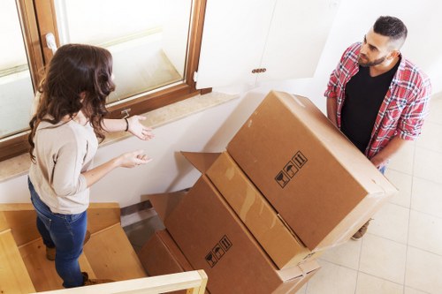 Loading boxes and furniture for a move in Woolwich