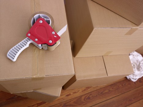 Household items prepared for transport by a removal van in Woolwich