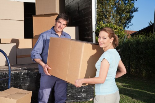 Prepared moving van for removals in Woolwich near apartment blocks